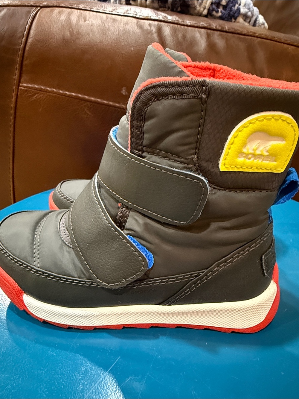 Sorel Brand Kids Black Winter Boots with Red Trim & Blue Velcro Closure